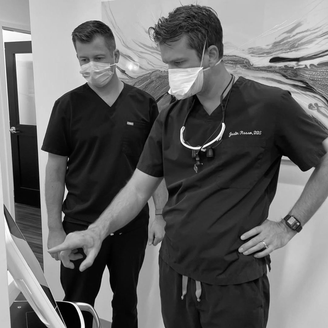 Dr. Russo discussing images with other doctors