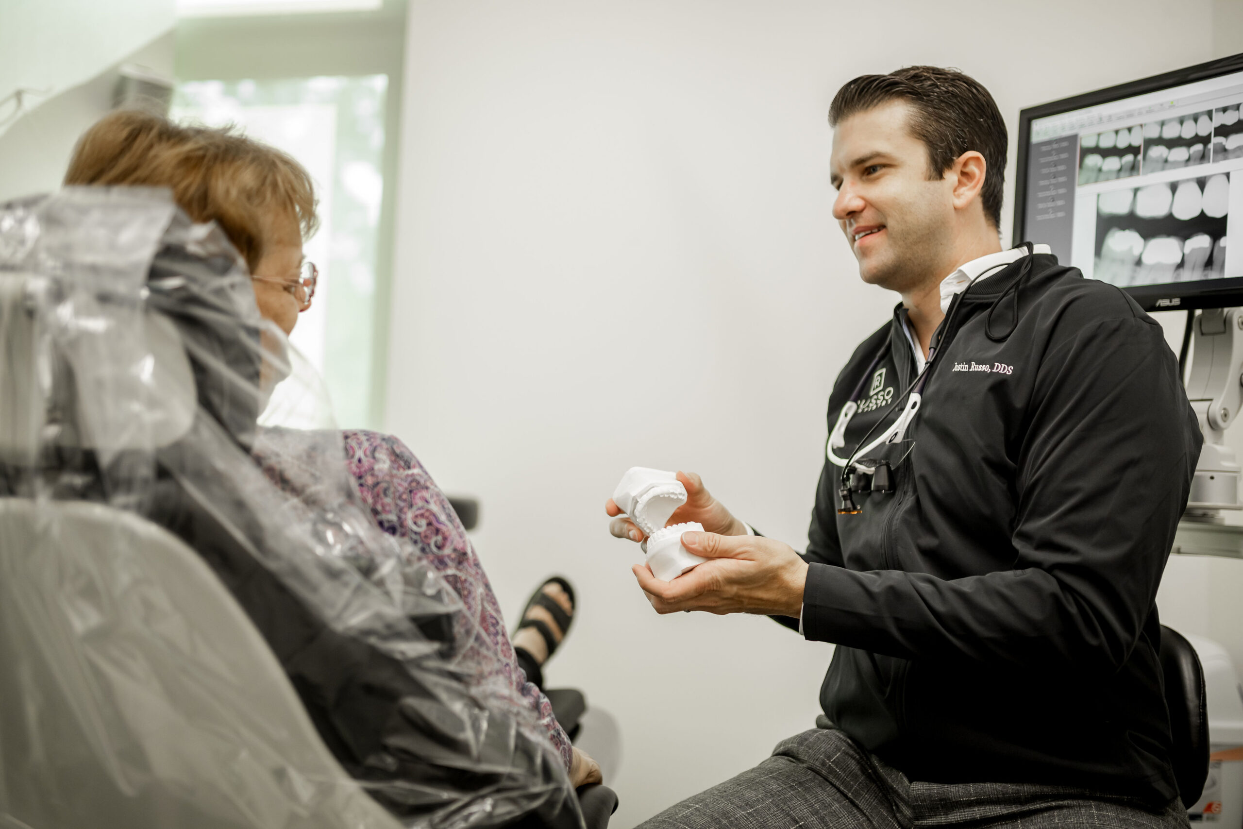 russo smiling with teeth porcelain crowns same day blog post for raleigh dentist